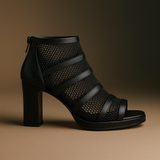 Carla – Sandalia abotinada de tacón