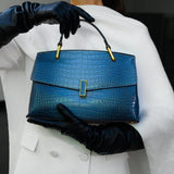 Adriana – Bolso estructurado con solapa