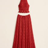 Isabela – Conjunto halter fluido con falda larga
