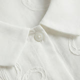 Sirena – Blusa bordada con cuello redondo