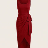 Kira – Vestido midi drapeado con nudo lateral