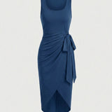 Kira – Vestido midi drapeado con nudo lateral
